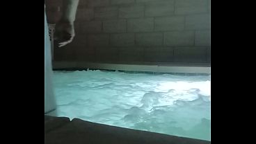 Sexy man in hot tub