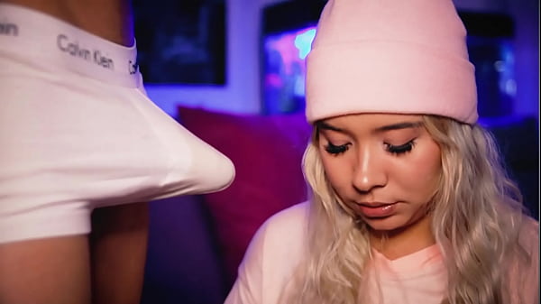 Girl with cute face loves to play with her boyfriend's cock while he checks his phone 