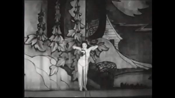 Classic brunette beauty shows off sexy lingerie strips on stage