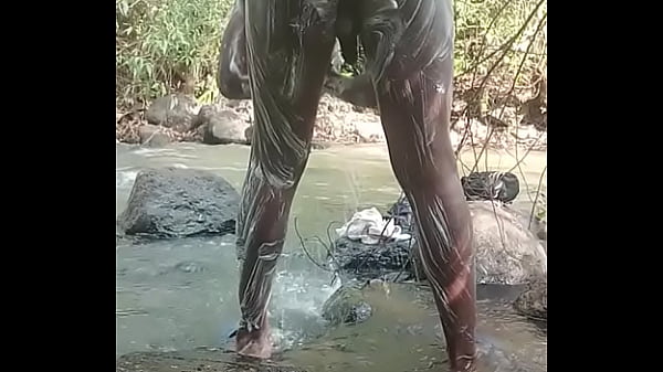 Big black dick guy masturbation while taking a shower outdoors and shooting big load 