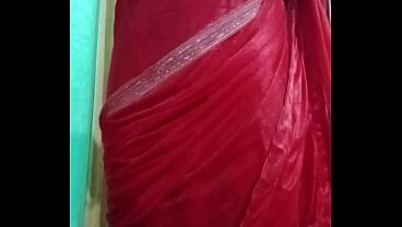 Indian Gay Crossdresser Bottom Gaurisissy pressing her big boobs and feeling horny in red saree with heavy jwellery