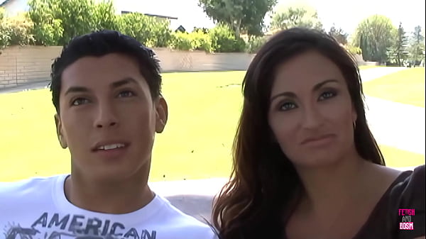 Mia Valentine, A Curvaceous Married Woman With A Brunette Complexion, Exposes Her Breasts In The Presence Of Her Spouse thumbnail