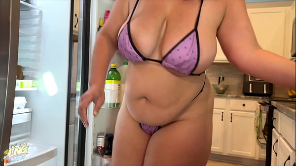 Thick milf shakes tits in tiny bikini