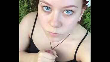 Redhead slut gives a nasty blowjob deep in the forest video thumbnail