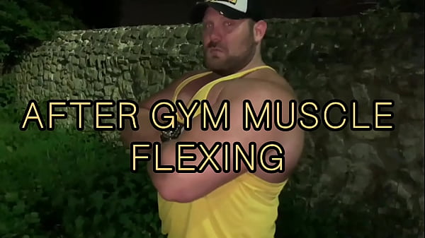 Muscle flexing after gym in the carpark 