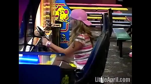 Public teen Little April masturbates_in arcade toilets