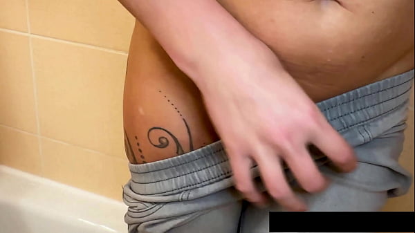 Claudia's playful bathroom selfie