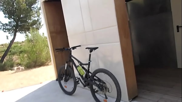 exhib naked for a ride on montain bike 