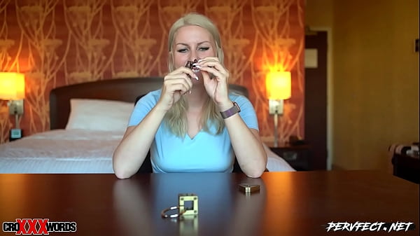 Blonde bimbo plays with puzzles while cumming.