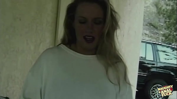 A large cock is inserted deep within the asshole of a dirty blonde chick