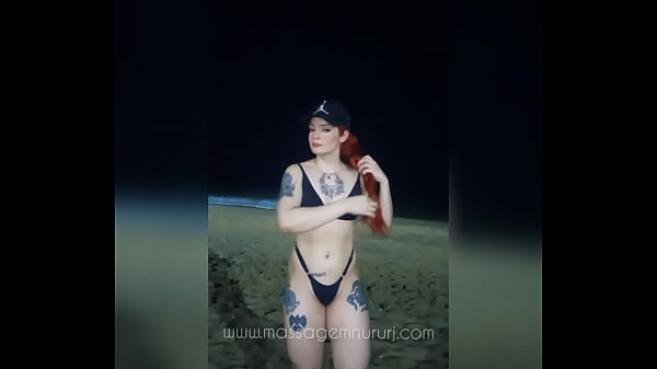 Red haired masseuse on copacabana beach