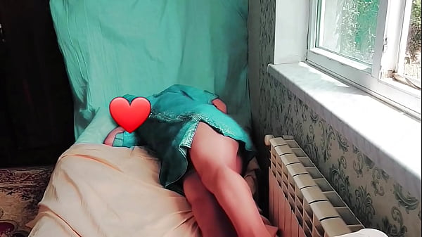 Cute femboy holding warm cup with sleepy eyes 