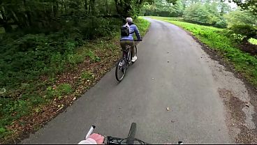 A woman in the woods riding a bike i ask her to watch my bike so it doesn't get stolen when i go to urinate i call her over and she helps me masturbate and gives me a blowjob under the green nature of the public forest 