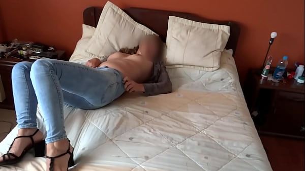 Beautiful stepmother masturbates with her jeans on and asks me to cum in her ass 