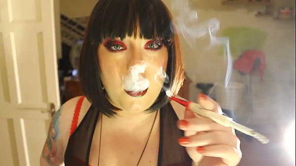 Fat DommeTina Smua Smokes A Filterless CigaretteIn A Holder