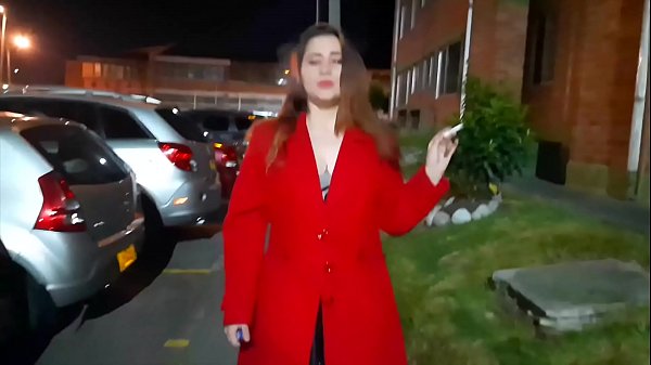 Melly goes for a walk outside her house in very sensual lingerie walks slowly in her heels her coat and lights a cigarette