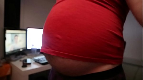 Belly trying on old shirt and jiggling 