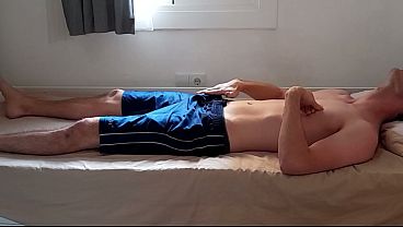 Hot guy teases himself through his shorts after the gym