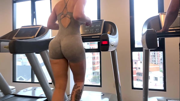 At the fitness girl with a big ass running on the treadmill 