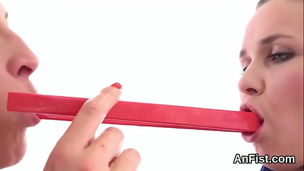 Lesbian teenie gets her shaved muff and anal fisted 