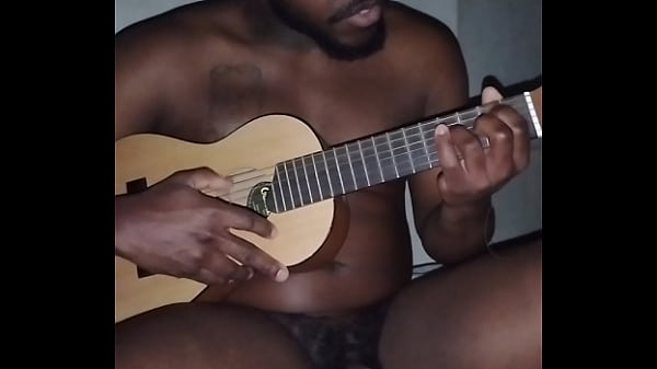 Translating other meanings of horns in the air while singing and playing guitar naked 