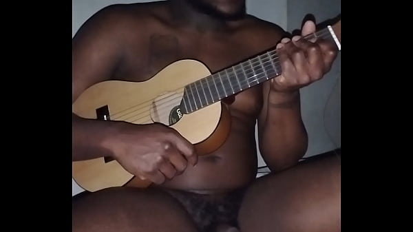 Nonton Translating Other Meanings Of Horns In The Air While Singing And Playing Guitar Naked thumbnail