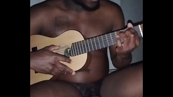 Translating other meanings of horns in the air while singing and playing guitar naked 