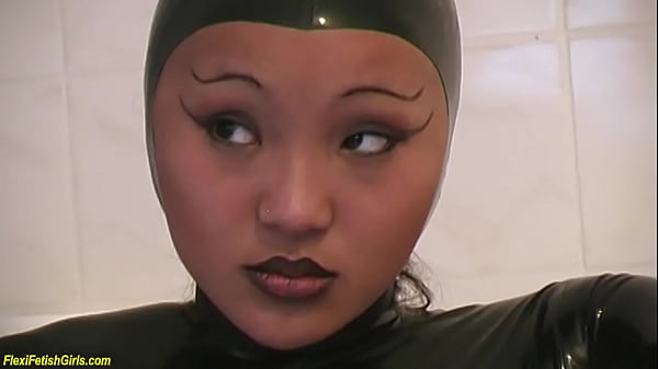 Photo Shoot With A Rubber Latex Catsuit Contortion Girl thumbnail