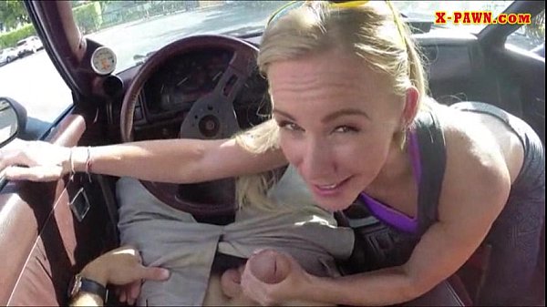 Blonde bimbo gives_a road head while test driving her car