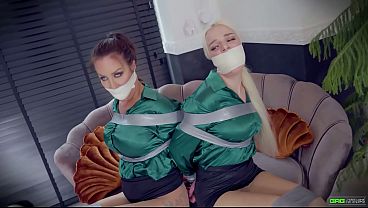 Young Blonde And Brunette Heavily Bound And Wrapgagged Together Moaning Through The Gags Ep 2 thumbnail