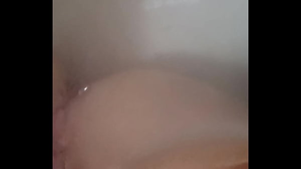 Playing in the tub with my toy 