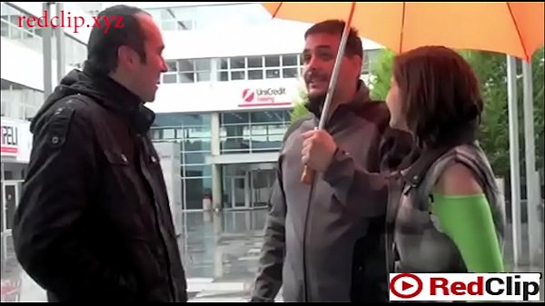 Pretty teen gal stands doggy fashionoffering this handsome guy