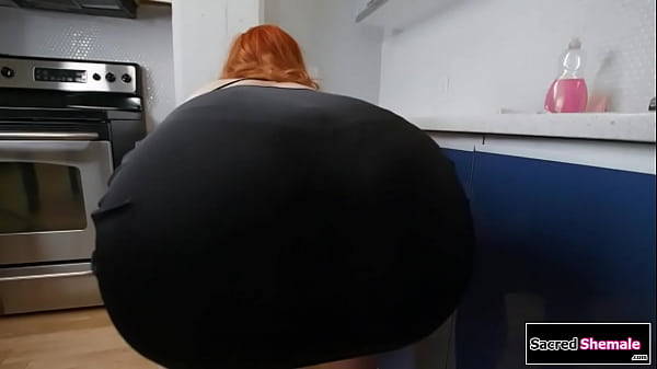 Redhead tranny Evie Envy bends over to clean and her bf jerks off to her.He plays with the tgirls big tits and the ts sucks his cock and is barebacked 