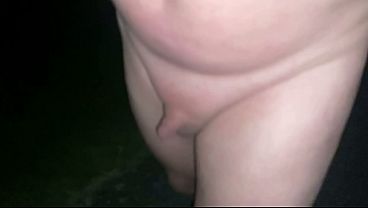 Nude walking outside at night