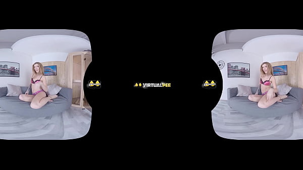 Redhead gets off while pissing in virtual reality