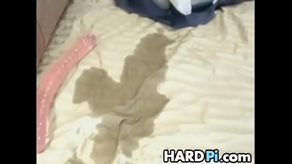 Hotbabe toys her pussy andsquirts