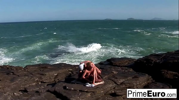 Bustyblonde Tarra takes a white and a black cock