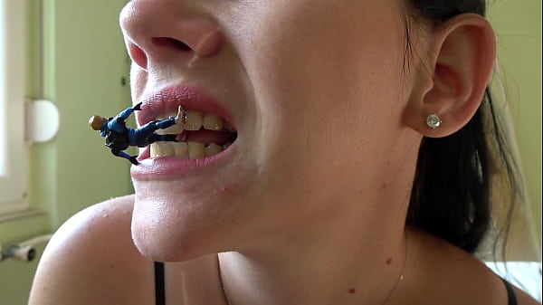 Beautiful giantess Annaplays with a tiny man