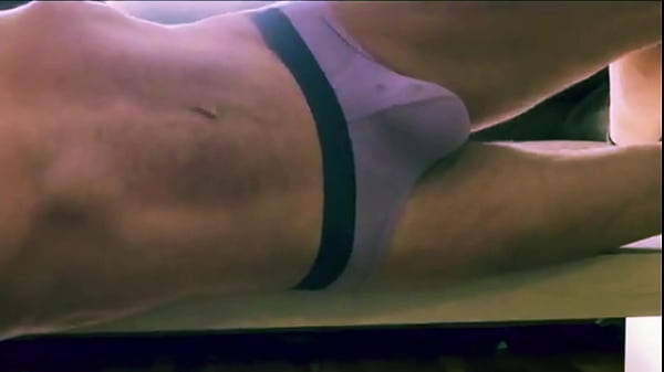 Mayofascial Pain Relief Laying down on table in Undies 