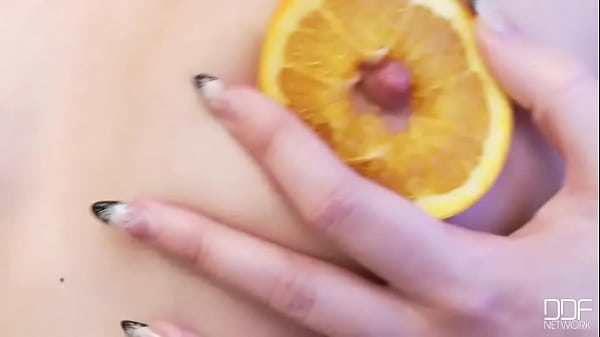 Getting herself orange juicy 
