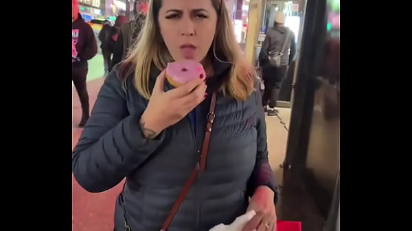 Licking the pink icing off this donut is a little 