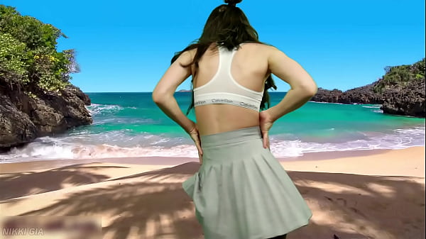 She's dancing on the beach without panties 