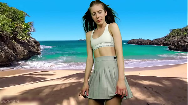 She's dancing on the beach without panties 