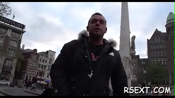 Hottie sucks dick with condom