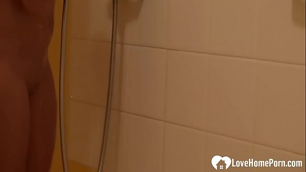 Brunette with tattoos has a nice shower