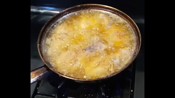 Tristina Millz Cooking Chicken