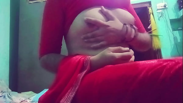Indian  crossdresser in red saree  pressing her nipples 