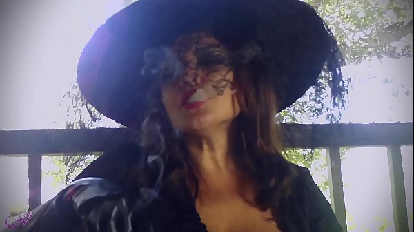 Goddess Paulina The Witch Smokes Outdoors thumbnail
