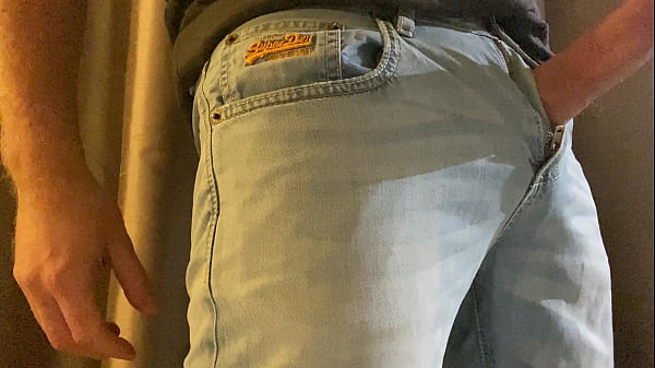 Large hard cock_wanking_through_jeans