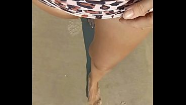 Bikini wetting on the beach